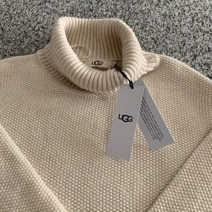 New Ugg sweater with tags. Never has been used.